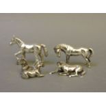Two silver miniature horses, and two silver plated miniature horses