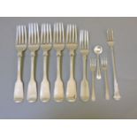 Five Victorian silver forks, together with further silver ware, pickle forks, etc