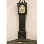 An 19th century carved longcase clock, eight day movement, gilt brass break arch dial with