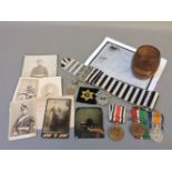 Various medals, photographs of soldiers, badges, etc, including a Mercantile Marine medal to 'Alfred