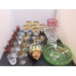 A quantity of glassware, including a set of six engraved wine glasses, vases, a majolica style