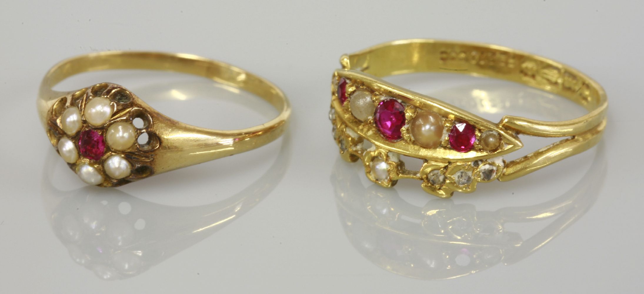 An 18ct gold ruby and split pearl boat shaped ring, with a split pearl and diamond set tiara to