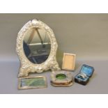 Silver items, including a modern easel frame by R C, Sheffield 1992, two small photo frames, a watch