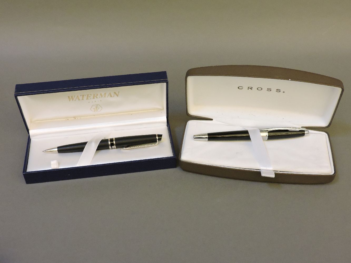 A modern 'Waterman, Paris' biro, in original box, and a Cross pencil/roller ball/ballpen, with