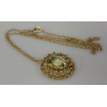 A 9ct gold citrine pendant and chain