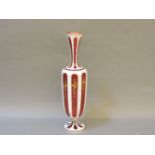 A 19th century cranberry cased Bohemian glass vase