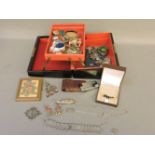 A jewellery box and contents, including silver items of jewellery