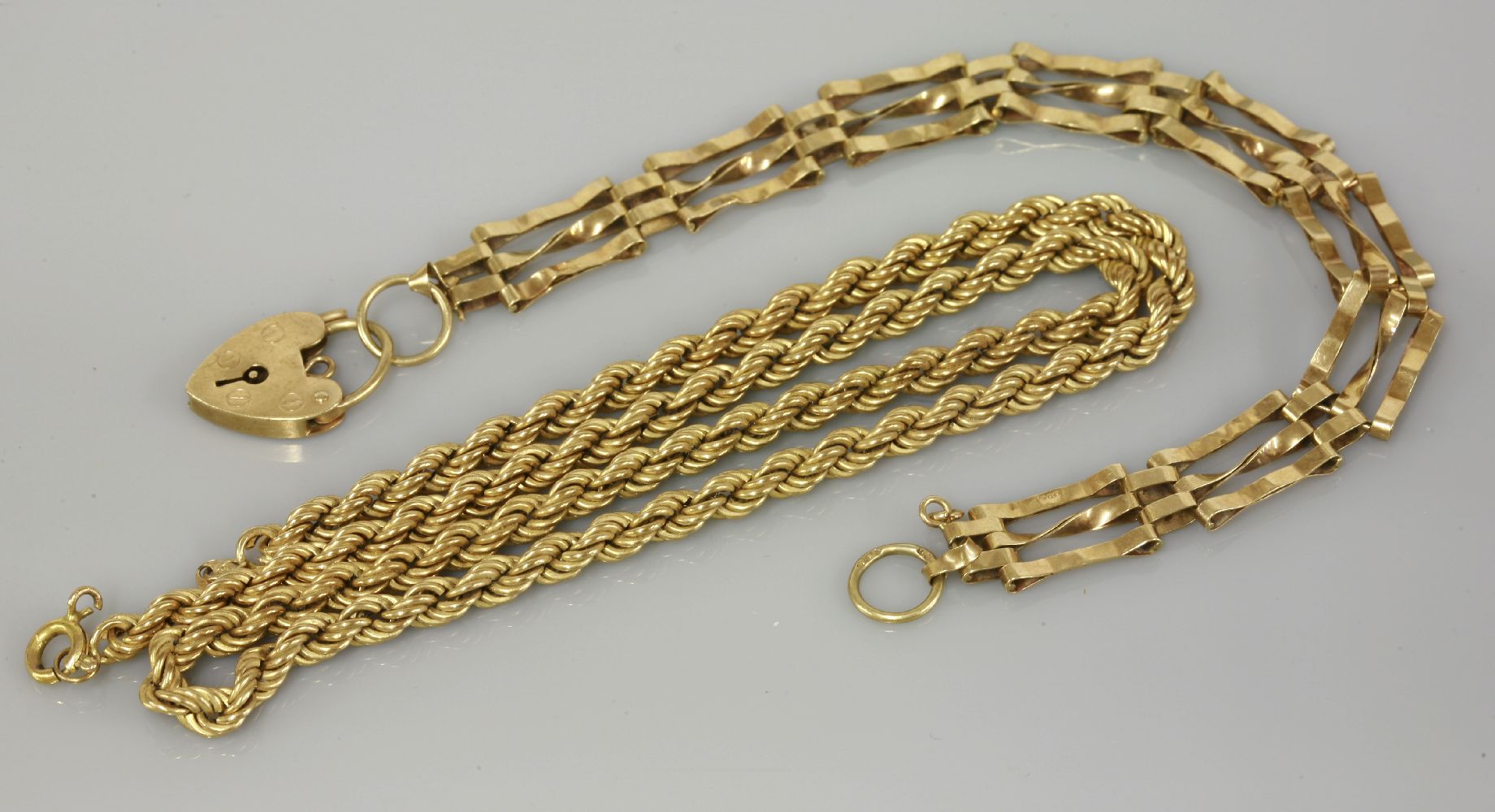 A 9ct gold rope chain, and a 9ct gold gate bracelet, 12.06g