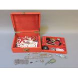 A red jewellery box and contents, including a 9ct gold penknife, etc