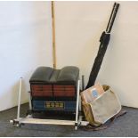 A collection of fishing tackle, including fishing seat, rods, reels, etc