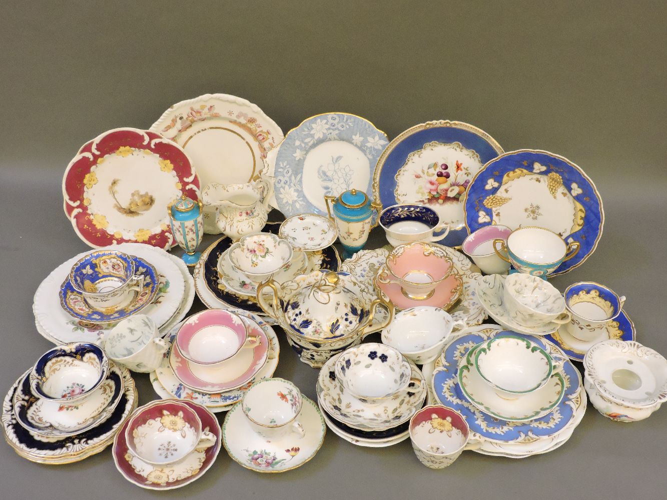 A collection of Rockingham, including plates, dishes, cups and saucers, most items with puce mark,