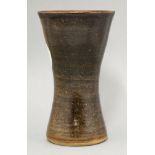 A studio stoneware vase,of cylindrical form with a waisted body, with a seal mark,20.5cm high