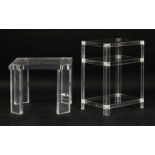 A Lucite side table, with a thick square top, raised on canted supports,60cm square49cm high, anda