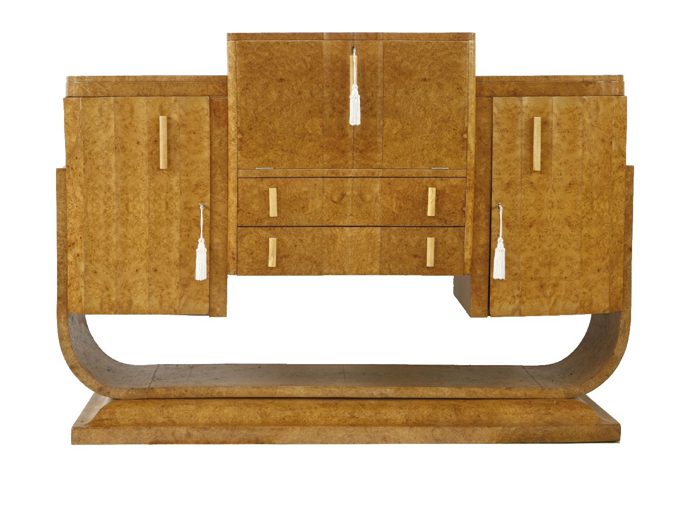 An Art Deco burr maple cocktail cabinet,attributed to Epstein, the raised centre with a hinged top