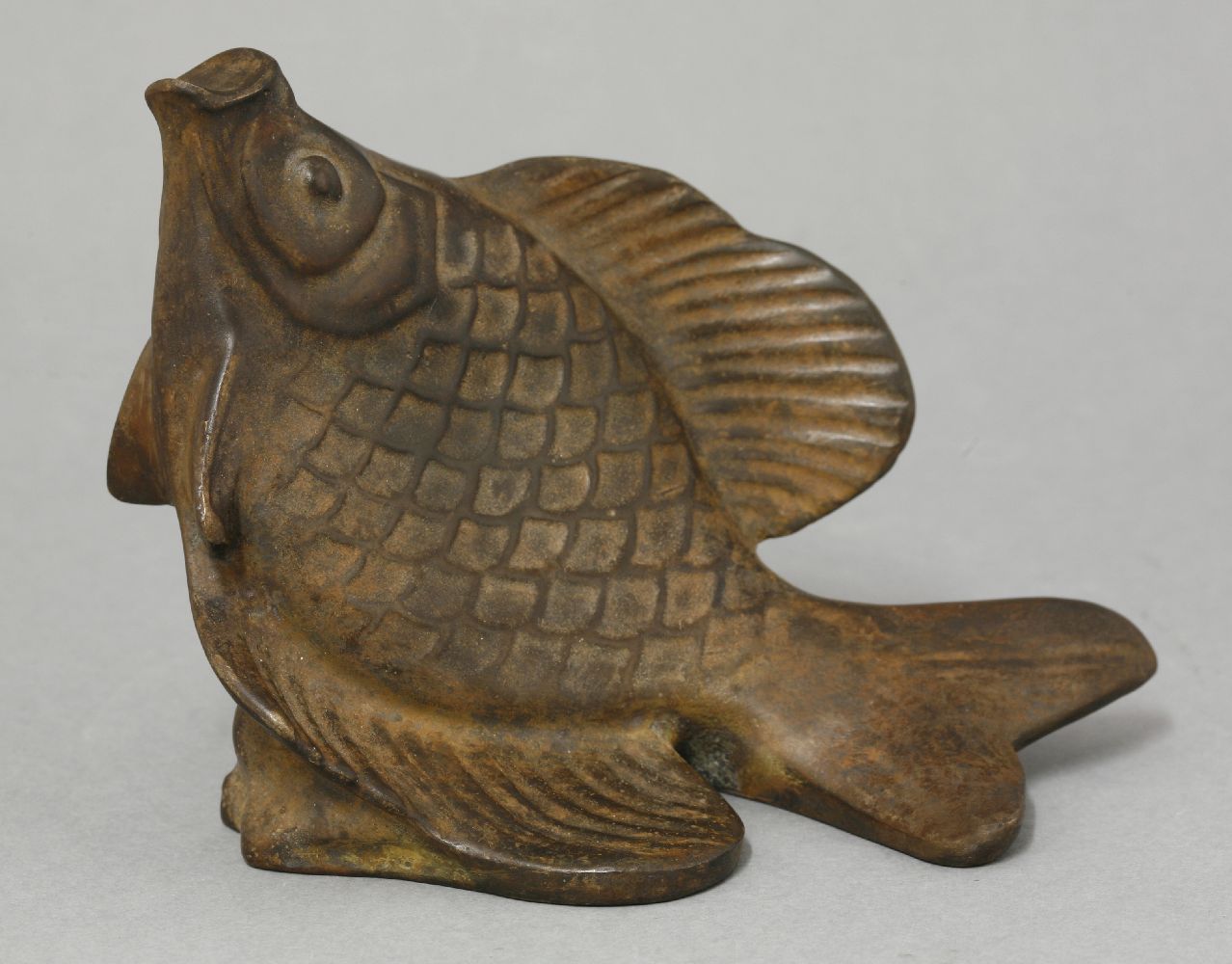 A bronze fish,by Édouard-Marcel Sandoz, signed and inscribed 'Susse Fr Edn Paris',10.5cm