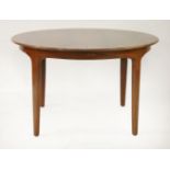 A Danish rosewood circular dining table,Model 62, designed by Henning Kjærnulf for Sorø Stolefabrik,