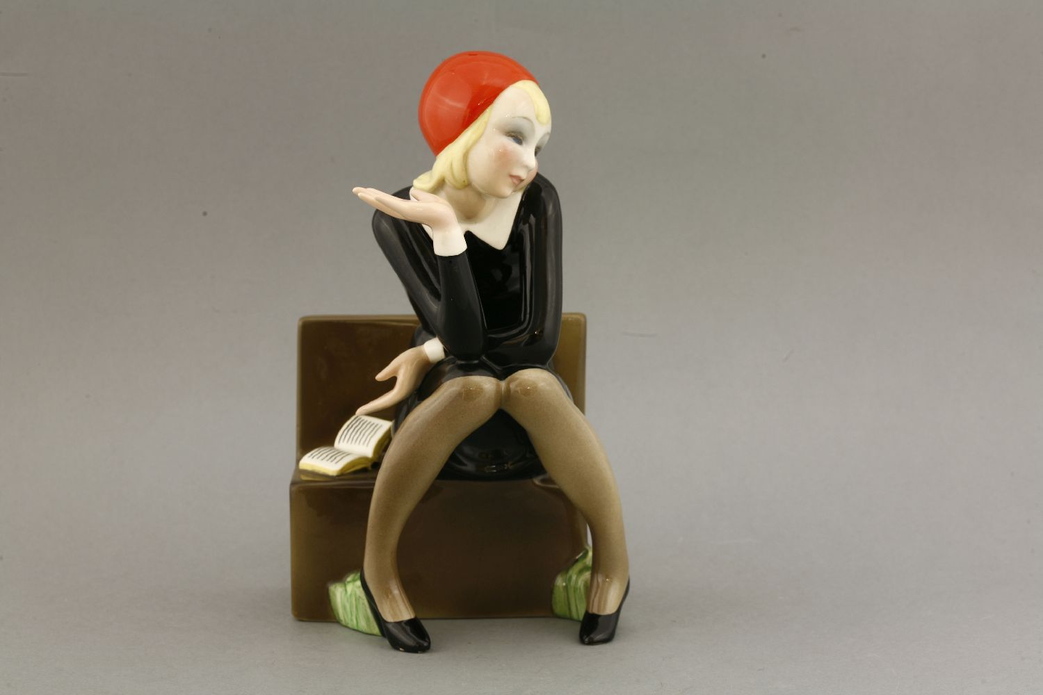 A Lenci figure,'Nella', modelled by Helen Koenig Scavini, modelled as a girl seated on a bench - Image 2 of 7