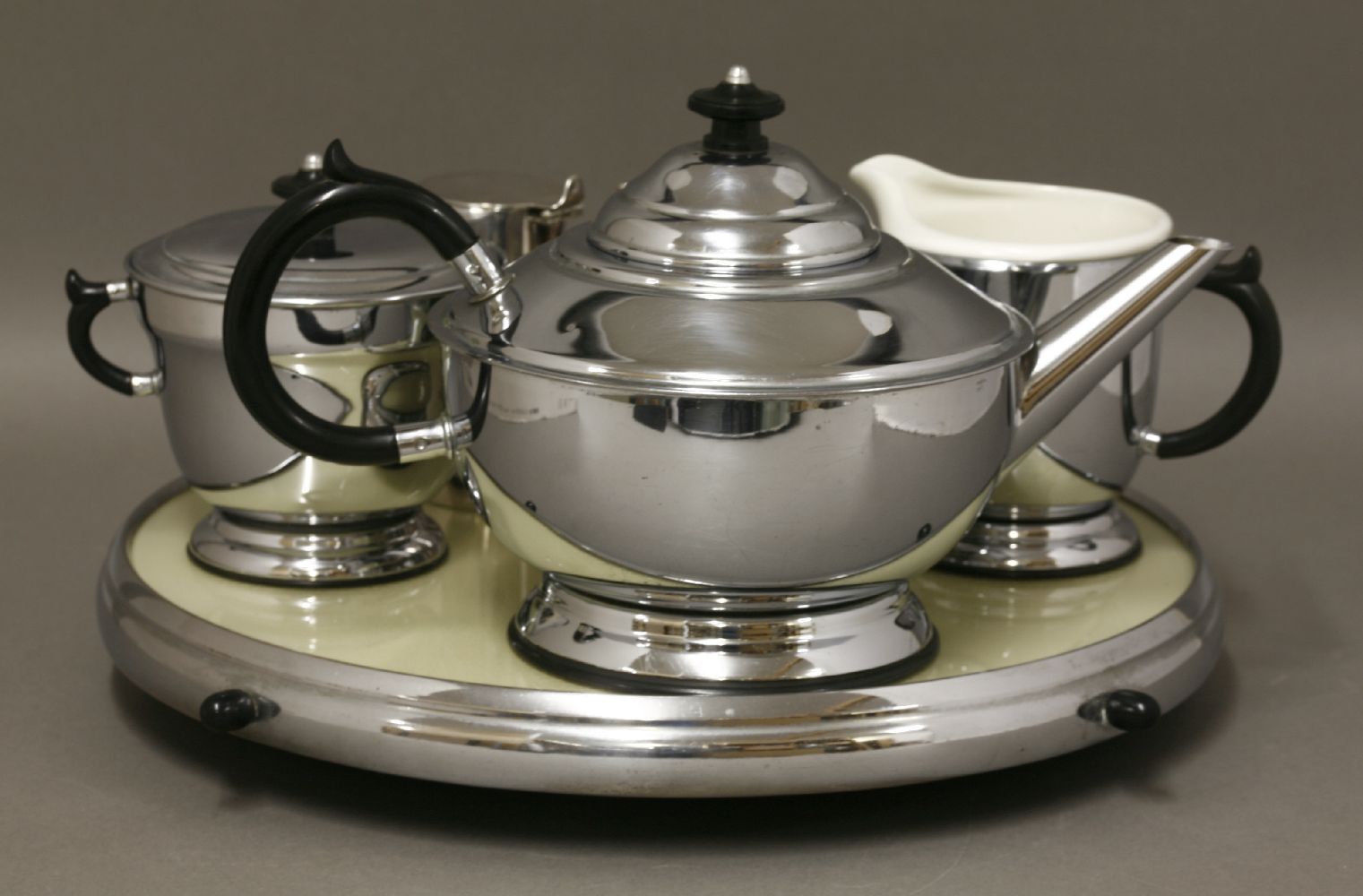 An Art Deco chrome and Bakelite three-piece tea set,on a lazy Susan stand,37cm diameter, anda Walker - Image 2 of 2