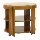 An Art Deco oval walnut table,with a quarter veneered top and strut supports with two undertiers,