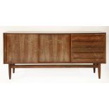 A Danish rosewood sideboard,by H P Hansen Møbelindustri, with sliding cupboards and five drawers