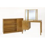 An oak dressing table,with a drawer and cupboard to one side,101cm wide55cm deep72cm high,together