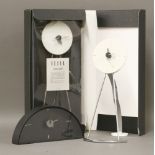 Three SESSA clocks,designed by Takashi Kato, two easel clocks, one boxed, and another (3)