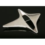 A sterling silver brooch, c.1960,by Georg Jensen, No. 339, designed by Henning Koppel, abstract form