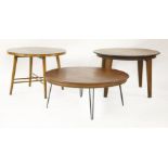 Three Danish walnut and teak coffee tables,each with a circular top raised on turned beech, tapering