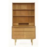 A Danish teak lounge unit,with shelves, drawers and a pull-out surface,89cm wide44cm deep167cm high