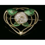 An Arts and Crafts blister pearl and enamel gold rose brooch,with a blister pearl rub set to the