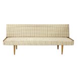A Danish oak day bed,with beige latticed upholstery,195cm wide