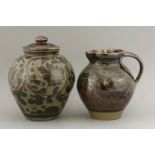 A stone jug and a vase and cover,by Miranda Thomas, both incised with flowers or birds, seal marks,