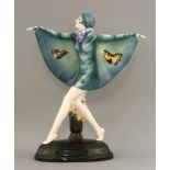 A Goldscheider pottery figure,'The Butterfly Girl', modelled by Josef Lorenzl, her arms