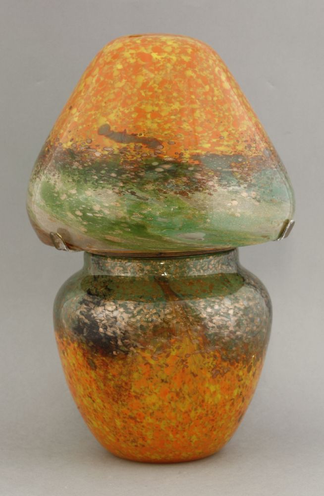 A Monart glass table lamp,the shade and base in mottled green and orange with gold aventurine