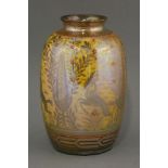 A Pilkington's Royal Lancastrian lustre vase,of cylindrical form decorated with a repeating band