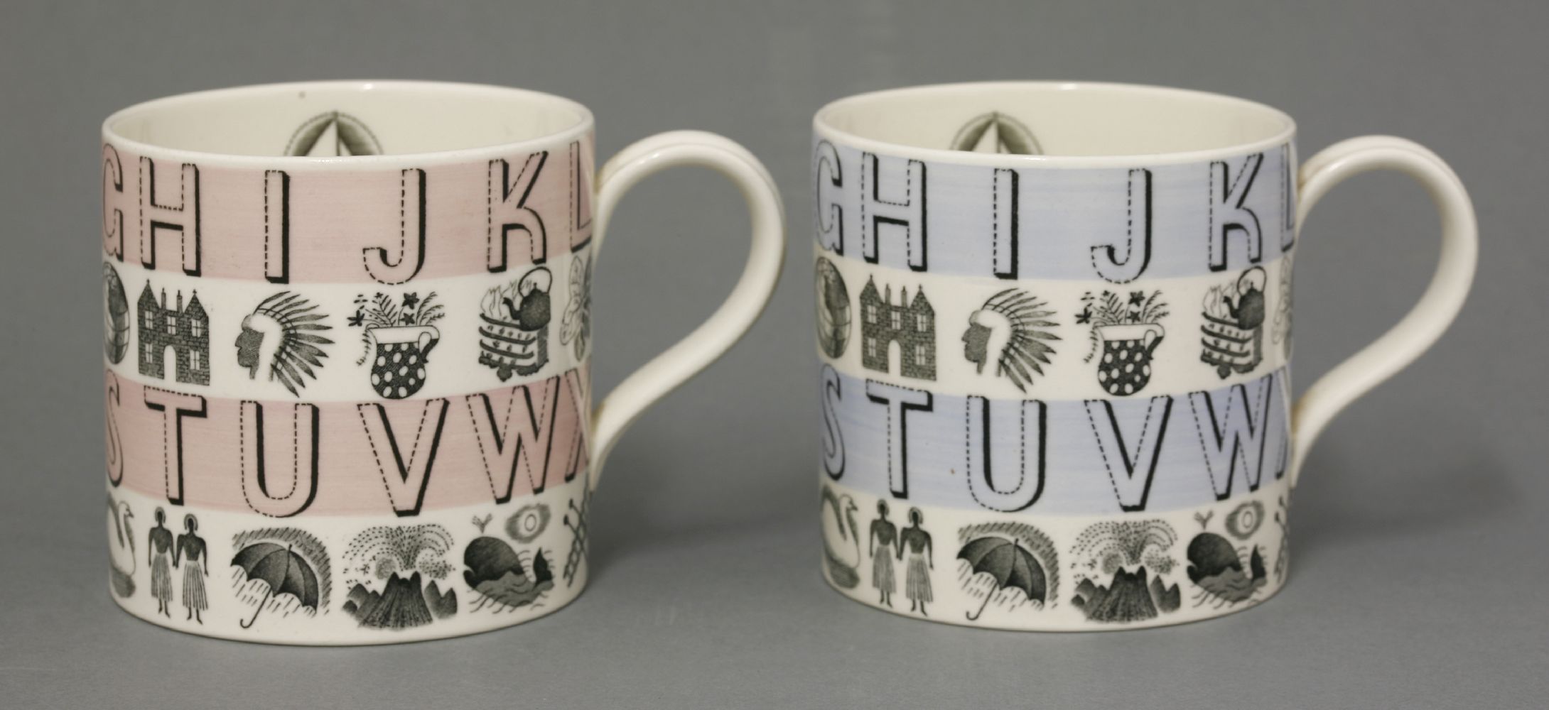 Two Wedgwood 'Alphabet' mugs,designed by Eric Ravilious, with pink and blue banding,8cm high (2)