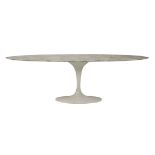 A 'Tulip' dining table,designed by Eero Saarinen, manufactured by Knoll International, the oval