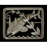 A sterling silver dolphin plaque brooch by Georg Jensen, No. 251,a pair of leaping dolphins with