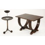 An Art Deco walnut coffee table,with a quarter veneered top, on 'U' shaped supports,63cm wide,