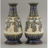 A pair of Doulton Lambeth stoneware vases,dated 1878, by George Tinworth (1843-1913), impressed