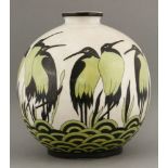 A Keralouve style pottery vase,the crackle glazed body painted and glazed with storks, printed