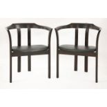 A pair of mahogany barrel back desk chairs,with black leather seats (2)