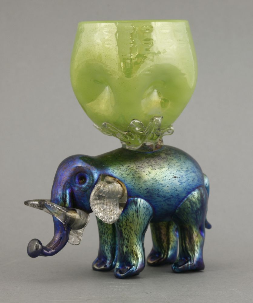 A rare Loetz iridescent elephant vase,the elephant with clear glass jaw, ears and tusks, the vase in