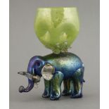 A rare Loetz iridescent elephant vase,the elephant with clear glass jaw, ears and tusks, the vase in
