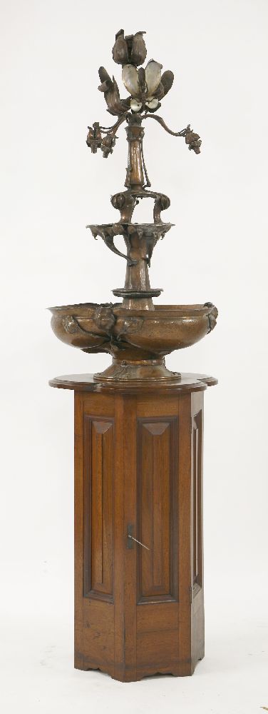 An Arts and Crafts copper fountain,designed by Joseph Hodel and G P Bradley for the Bromsgrove