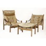 A Norwegian 'Hunter' range suite,comprising a pair of rosewood effect bubinga and leather loungers