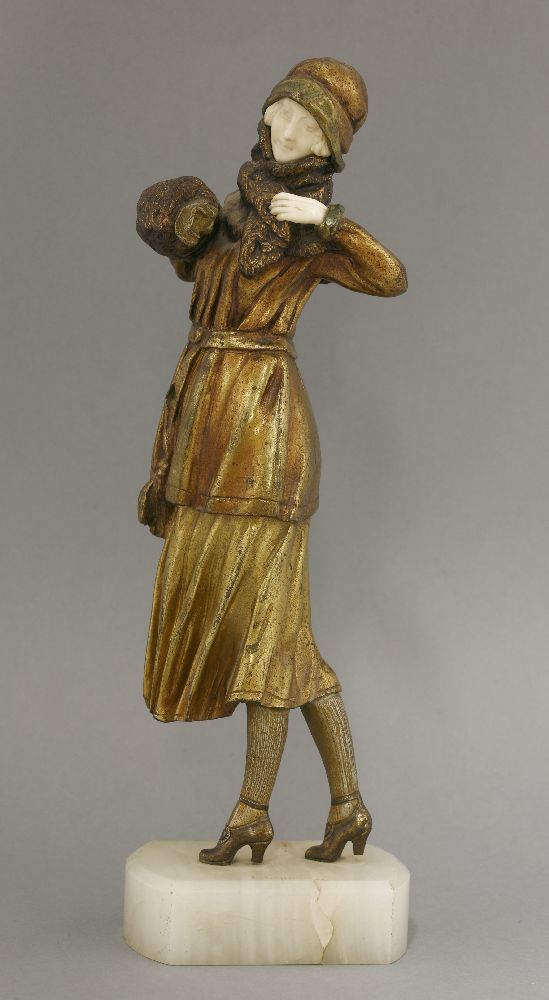 Demétre H Chiparus (Romanian, 1886-1947),'Winter', a gilt bronze and ivory figure of an elegant lady