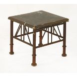 A 'Thebes' style stool,with an embossed linen seat, worn,38cm square35cm high