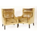 A pair of armchairs,with sandy leather upholstery (2)