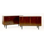 A pair of Danish rosewood sideboards,one with a cupboard enclosing shelves, the other with a